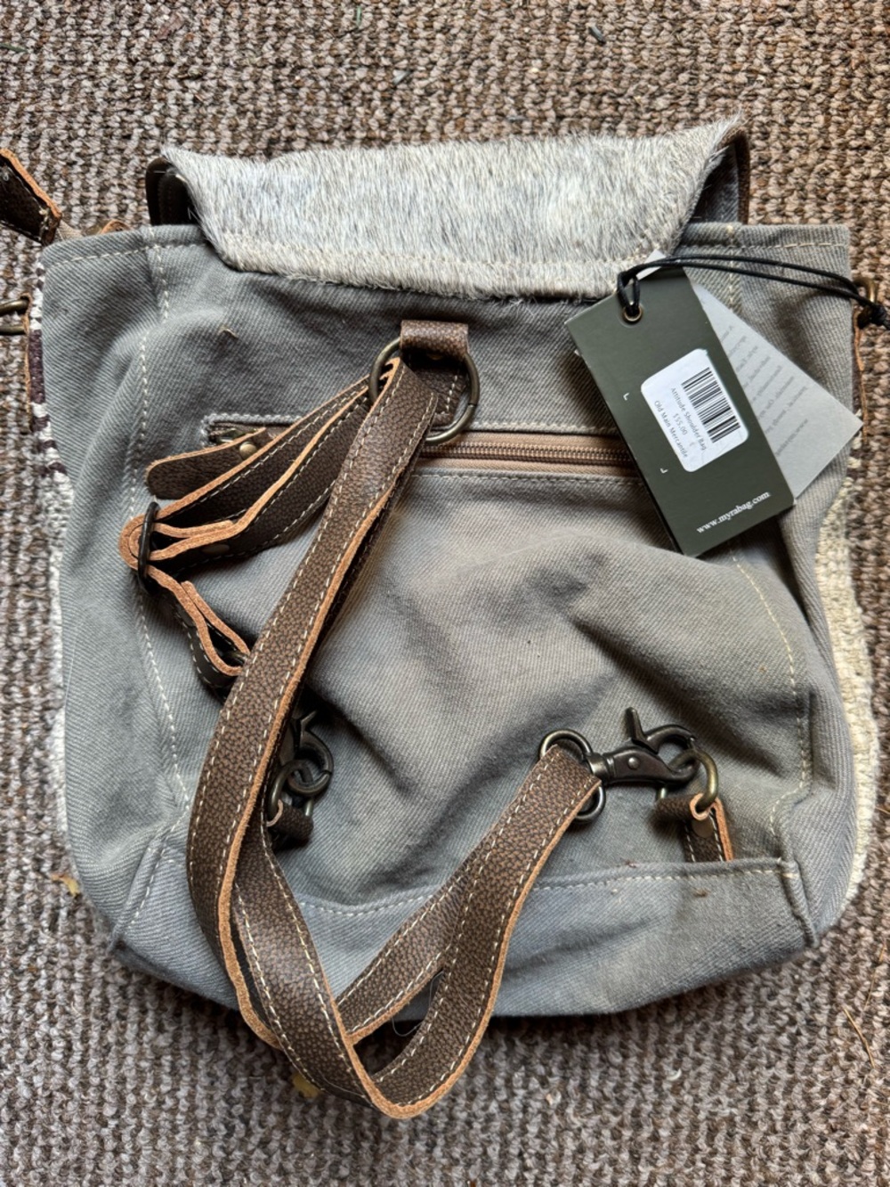 Canvas Shoulder Bag with Brown Leather Straps and Gray Fur Accent